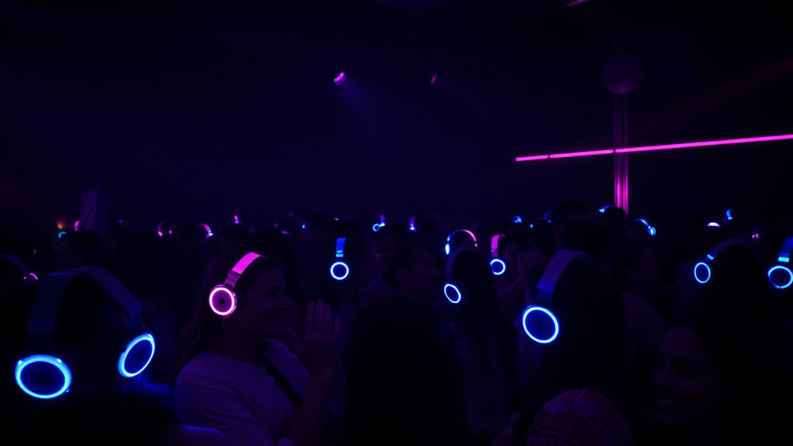Silent Disco Hire in Devon — guests wearing LED headphones on the dancefloor